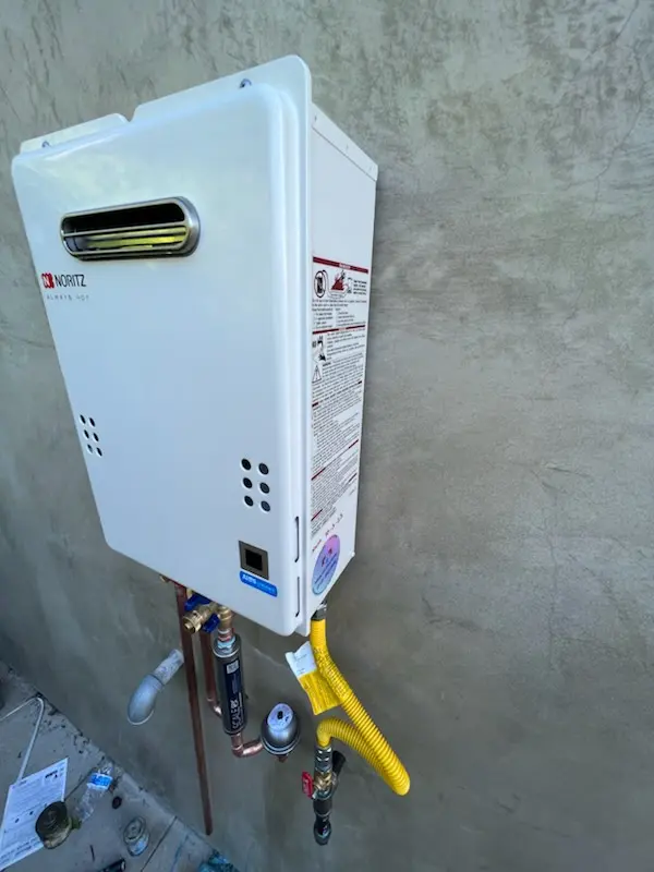 Tankless water heater installation for Marquette homes